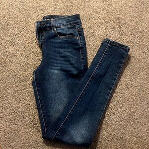 fashion nova, mid-rise dark blue jeans, size 5/6